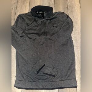 Black Under Armour golf half zip pullover
